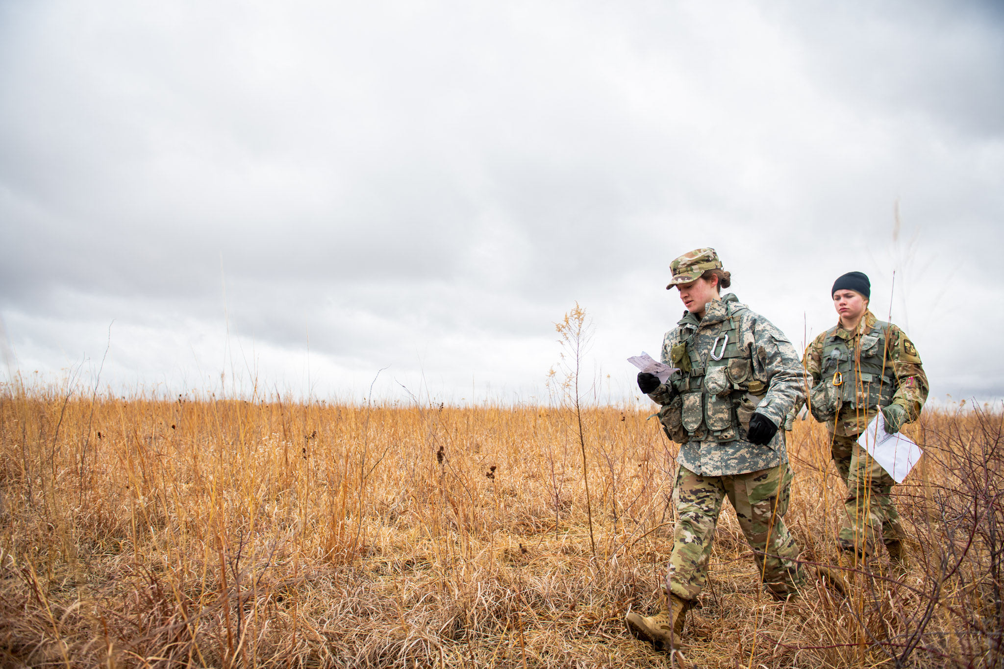 ROTC students walking in a field